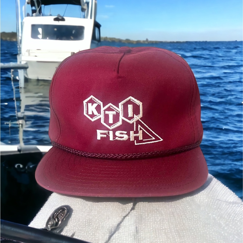Vintage KTI fishing dad hat with leather and gold Terry cloth lining forehead